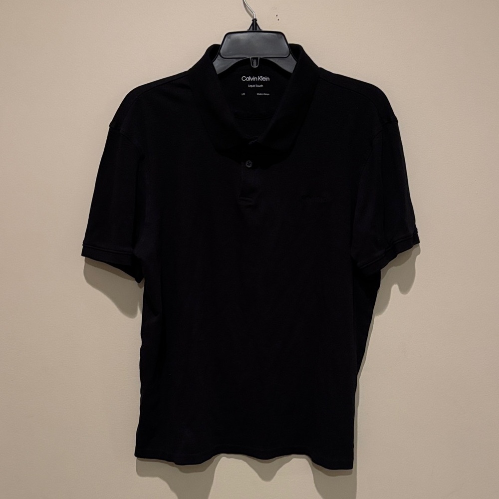 Calvin Klein Men’s Black Polo Shirt with Subtle Logo